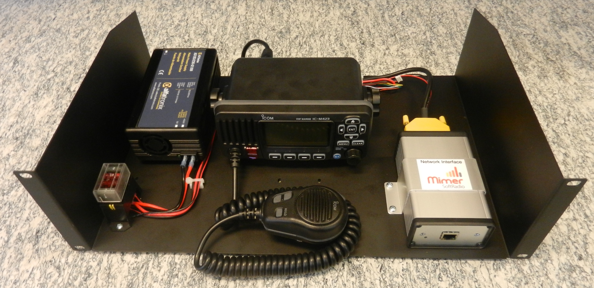 Rack shelf with marine radio installation